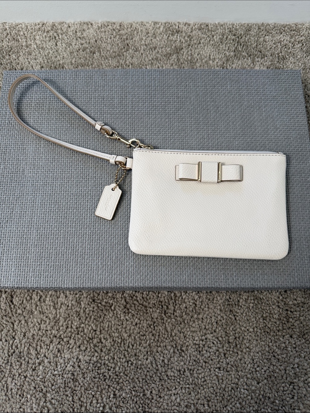 Coach Cream Leather Wristlet with Bow Accent